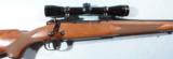 LIKE NEW WINCHESTER MODEL 70 SG SUPER GRADE .300 WIN MAG CRF(CONTROLLED ROUND FEEDING) BOLT ACTION RIFLE WITH LEUPOLD SCOPE. - 2 of 7