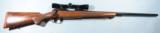 LIKE NEW WINCHESTER MODEL 70 SG SUPER GRADE .300 WIN MAG CRF(CONTROLLED ROUND FEEDING) BOLT ACTION RIFLE WITH LEUPOLD SCOPE. - 1 of 7