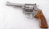 TAURUS MODEL 94 9-SHOT .22LR STAINLESS D.A. REVOLVER. - 1 of 7