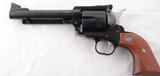 NEAR MINT RUGER NEW MODEL RUGER BLACKHAWK .45COLT& .45ACP 5 1/2" SINGLE ACTION REVOLVER WITH TWO CYLINDERS, CIRCA 2000. - 1 of 7