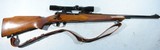 EARLY WINCHESTER MODEL 70 PRE-64 FEATHERWEIGHT .243 WIN. CAL. RIFLE CA. 1959 WITH SCOPE. - 1 of 9