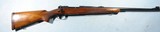 EXCELLENT WINCHESTER MODEL 70 PRE-64 BOLT ACTION.375 H&H CAL. RIFLE MANUFACTURED IN 1953. - 1 of 9