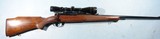 WINCHESTER MODEL 70 PRE-64 BOLT ACTION .300 H&H CAL. RIFLE MANUFACTURED IN 1959 W/LEUPOLD 3X9 SCOPE. - 1 of 10