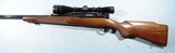 WINCHESTER MODEL 70 PRE-64 BOLT ACTION .300 H&H CAL. RIFLE MANUFACTURED IN 1959 W/LEUPOLD 3X9 SCOPE. - 4 of 10