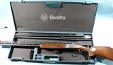 BERETTA 687 EELL OR 687EELL X TRAP COMBO WITH TWO BBLS (32" O/U AND 34" OVER SINGLE IN CASE, CIRCA 1992. - 1 of 10
