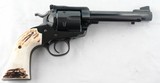 1985 RUGER NEW MODEL SUPER BLACKHAWK BISLEY .44 MAGNUM 5 1/2" S.A. REVOLVER WITH STAG GRIPS. - 1 of 5