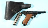PRE WW2 GERMAN DWM MODEL 1920 COMMERCIAL 7.65MM LUGER PISTOL W/WW2 BULGARIAN ARMY P08 LUGER HOLSTER. - 1 of 11