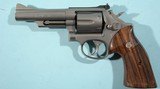 1987 SMITH & WESSON MODEL 19 19-5 .357 COMBAT MAGNUM 4" REVOLVER PRE-LOCK WITH DARK GRAY BRUSHED STAINLESS FINISH. - 1 of 5