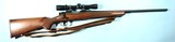 REMINGTON MODEL 700 .300 SAVAGE BOLT ACTION RIFLE WITH SCOPE & SLING CIRCA 2003. - 1 of 6