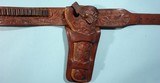 COLORADO SADDLERY CO. FLORAL CARVED 7 ½” SINGLE ACTION HOLSTER & MATCHING .45 CAL. WAIST SIZE 38 CARTRIDGE BELT CA. 1960’S. - 2 of 6