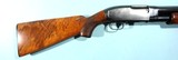 1957 WINCHESTER MODEL 12 DELUXE 12GA. PUMP SHOTGUN WITH SOLID MATTE RIB. - 2 of 11