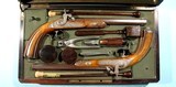 ORIGINAL CASED PAIR FRENCH PERCUSSION DUELLING/TARGET PISTOLS BY FERDINAND CLAUDIN (1835-90) OF PARIS CA. 1850’S. - 1 of 12
