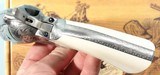 UBERTI MODEL 1873 SAA WHITE PHOTO ENGRAVED .45 LONG COLT 4 3/4" REVOLVER WITH IVORY LIKE GRIPS NEW IN BOX. - 8 of 9