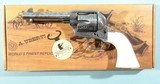 UBERTI MODEL 1873 SAA WHITE PHOTO ENGRAVED .45 LONG COLT 4 3/4" REVOLVER WITH IVORY LIKE GRIPS NEW IN BOX. - 1 of 9