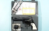 2014 NEW IN BOX RUGER NEW MODEL BLACKHAWK CONVERTIBLE .45LC / .45ACP 4 5/8" BLUE S.A. REVOLVER WITH IVORY LIKE GRIPS. - 1 of 6
