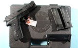 NEW IN BOX SIG SAUER P228 9MM SEMI-AUTO PISTOL W/ FOUR MAGS. - 7 of 7
