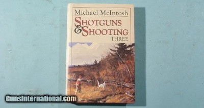 BOOK- “SHOTGUNS AND SHOOTING-THREE” BY MICHAEL MCINTOSH.