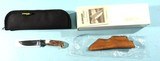SCARCE SCHRADE D’HOLDER MILLENNIUM 3 3/4” SAMBAR STAG SKINNING KNIFE W/LEATHER SHEATH AND CARRYING CASE IN ORIG. BOX CA. 2000. - 1 of 6