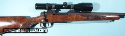 G. MCMILLAN & CO. TALON SPORTER CUSTOM HEAVY .338 WIN MAG RIFLE OCT BARREL & SCHMIDT & BENDER SCOPE.
