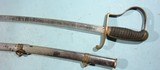 SPANISH-AMERICAN WAR U.S. MODEL 1872 MOUNTED ARTILLERY OFFICER’S SWORD AND SCABBARD CIRCA 1898. - 1 of 6