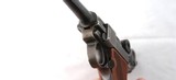 WW1 GERMAN DWM P-08 LUGER 9MM PISTOL. Reworked WW1 military with matching numbers. Toggle with “DWM” logo. Date and proofs removed post war re-work. G - 4 of 8