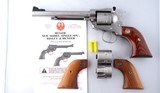 RUGER NEW MODEL STAINLESS SINGLE SIX 22 S.,L,LR/22 WIN. MAG. CONV. 6 1/2” REVOLVER W/ORIG BOX & MANUAL. - 1 of 4