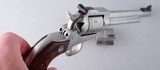 RUGER NEW MODEL STAINLESS SINGLE SIX 22 S.,L,LR/22 WIN. MAG. CONV. 6 1/2” REVOLVER W/ORIG BOX & MANUAL. - 3 of 4