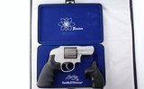 SMITH & WESSON MODEL 242 AIR-LITE TI TITANIUM .38 SPECIAL CAL. 7 SHOT 2 1/2” REVOLVER W/FACTORY CASE & EXTRA HOGUE GRIPS. - 1 of 6