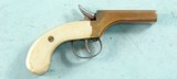 REPRODUCTION PERCUSSION BRASS DOUBLE BARREL .36 CAL. DERRINGER CIRCA 1960’S. - 1 of 3