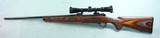 WINCHESTER MODEL 70 FEATHERWEIGHT .280 REM. CAL. RIFLE W/REDFIELD 2X7 TRACKER SCOPE AND ORIGINAL BOX. - 2 of 8