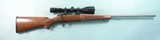 KIMBER MODEL 84 BOLT ACTION .223 REM. CAL STAINLESS & BLUE RIFLE W/REDFIELD 3X9 SCOPE.