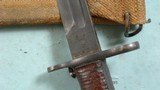 EARLY STYLE WW1 OR WWI U.S. MODEL 1905 "1918" RIFLE BAYONET WITH ORIGINAL CANVAS COVERED M1910 SCABBARD. - 5 of 10