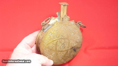 MOROCCAN ENGRAVED BRASS POWDER FLASK CIRCA 1800’S.