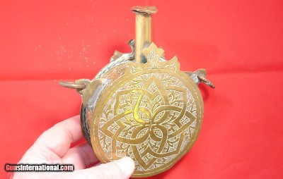 MOROCCAN ENGRAVED BRASS POWDER FLASK CIRCA 1800’S.