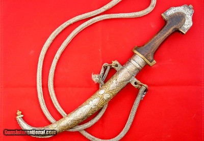 FINE SILVER MOUNTED AND ENGRAVED MOROCCAN JAMBIYA AND SCABBARD CIRCA EARLY 1800’S.