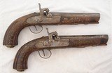 PAIR BALKAN PERCUSSION .64 CAL. OFFICER’S PISTOLS W/ ORNATE FLORAL WIRE INLAID STOCKS CA. 1850’S. - 1 of 10