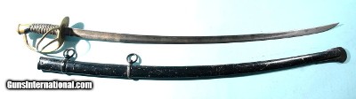 CIVIL WAR C. ROBY U.S. MODEL 1860 CAVALRY SABER DATED 1865 WITH SCABBARD.