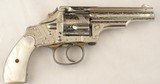EXCEPTIONAL FACTORY EXHIBITION GRADE ENGRAVED MERWIN & HULBERT MEDIUM FRAME FOLDING HAMMER D.A. .38 CF CAL. 3 1/2” REVOLVER CIRCA 1880’S. - 1 of 8