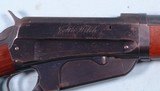 EXCEPTIONAL WINCHESTER MODEL 1895 TAKE-DOWN SPECIAL ORDER UNCHECKERED DELUXE FACTORY OWNER NAME ENGRAVED “JOHN WILCH” LEVER ACTION .35 WCF RIFLE CIRCA - 5 of 9