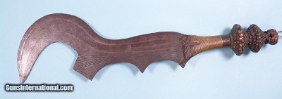 EARLY 20TH CENTURY NGOMBE NGULU SICKLE BLADE.