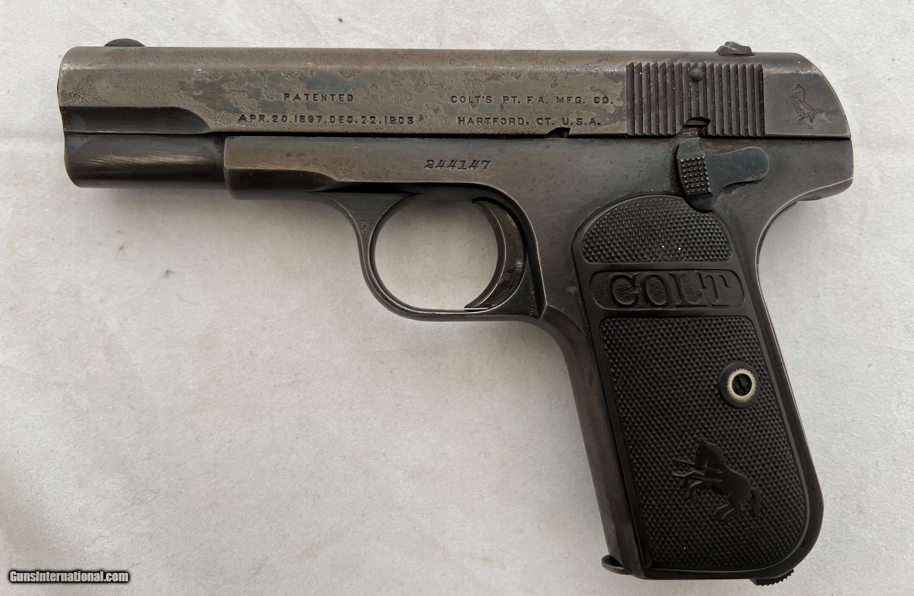 EARLY COLT MODEL 1903 HAMMERLESS .32 ACP PISTOL CIRCA 1909.