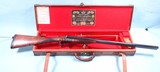 EXCEPTIONAL CASED JOSEPH LANG & SON, LONDON 12 GAUGE EJECTOR FACTORY SINGLE TRIGGER NEW CENTURY SIDE X SIDE SHOTGUN CIRCA 1904.