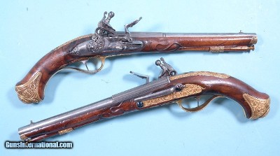 GERMAN GRAND DUKE ERNST AUGUST THE FIRST’S ORNATE PAIR OF ENGRAVED FLINTLOCK HOLSTER PISTOLS