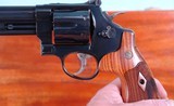 SMITH & WESSON MODEL 29 10 OR 29-10 .44 MAG. 6 1/2” REVOLVER NEW IN FACTORY BLUE BOX AND WITH WOOD DISPLAY CASE AS WELL. - 9 of 12