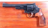 SMITH & WESSON MODEL 29 10 OR 29-10 .44 MAG. 6 1/2” REVOLVER NEW IN FACTORY BLUE BOX AND WITH WOOD DISPLAY CASE AS WELL. - 3 of 12
