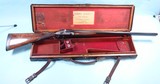 CASED HENRY ADKINS BAR IN WOOD THUMBHOLE 12 GAUGE SIDE X SIDE HAMMER SHOTGUN CIRCA 1880’S.