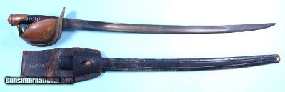 CIVIL WAR AMES U.S. MODEL 1860 NAVAL CUTLASS, SCABBARD AND RARE ORIGINAL BELT FROG WITH U.S.S. BATTLESHIP MISSOURI PROVENANCE.