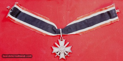 WW2 WWII GERMAN KNIGHT’S CROSS OF WAR MERIT WITH CROSSED SWORDS AND RIBBON.