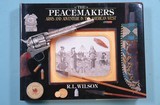 32174- THE PEACEMAKERS: ARMS AND ADVENTURE IN THE AMERICAN WEST BY R.L. WILSON SIGNED BY AUTHOR.