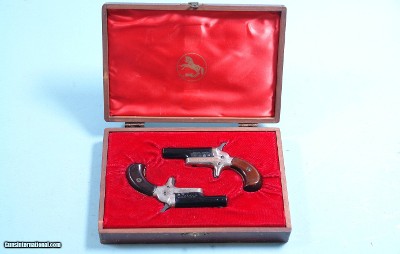 CASED PAIR OF COLT 4th MODEL LORD & LADY STYLE (LATER NAMED) .22 SHORT SINGLE SHOT DERRINGER OR DERINGER PISTOLS, CIRCA 1959-63.